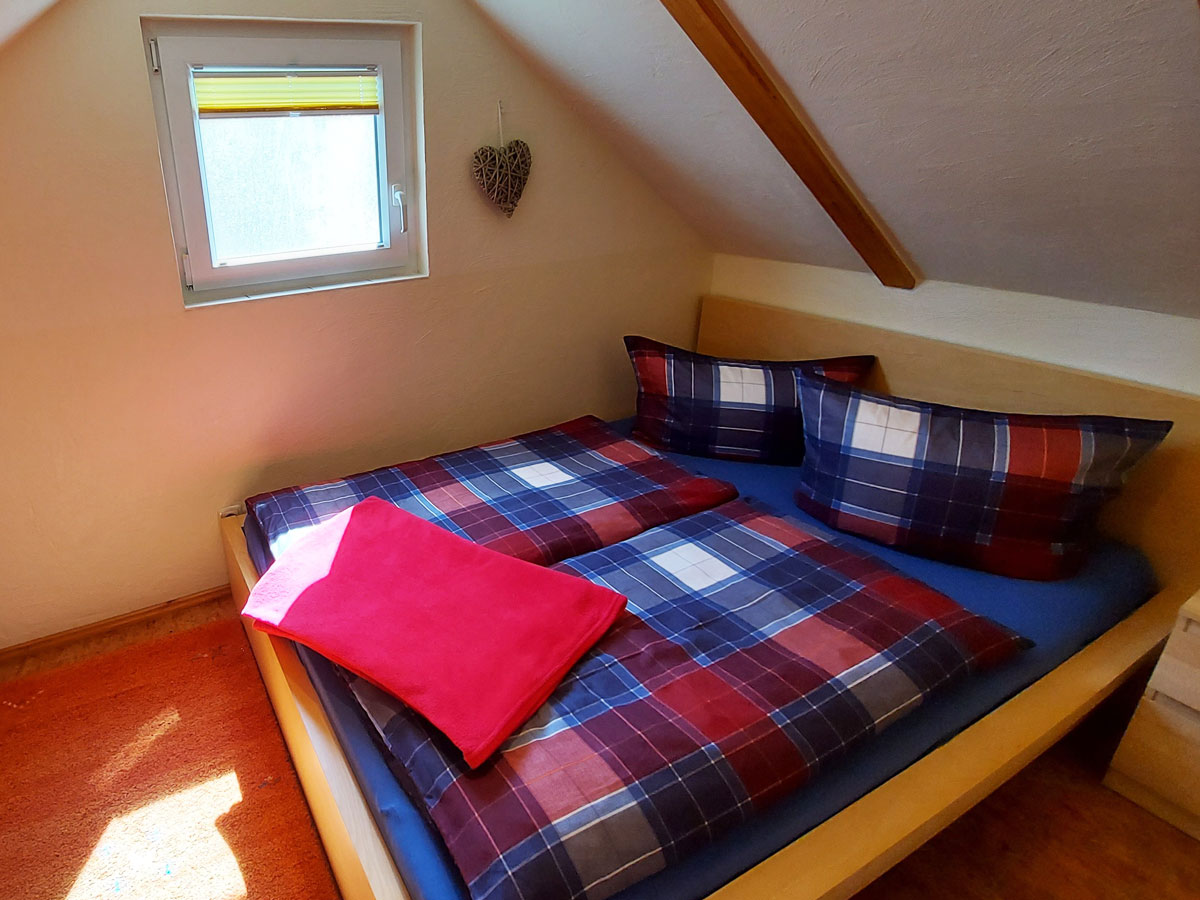 Ferienhaus Dorfbachklamm - Schlafzimmer1 mit Doppelbett